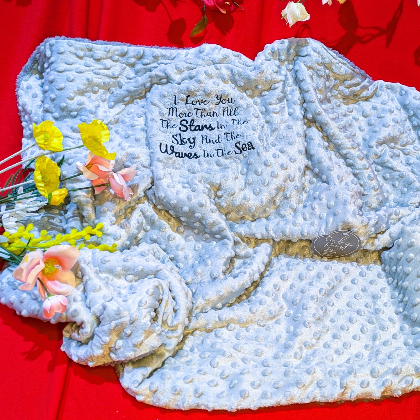 Beautiful embroidered baby blanket with glow in the dark stars.