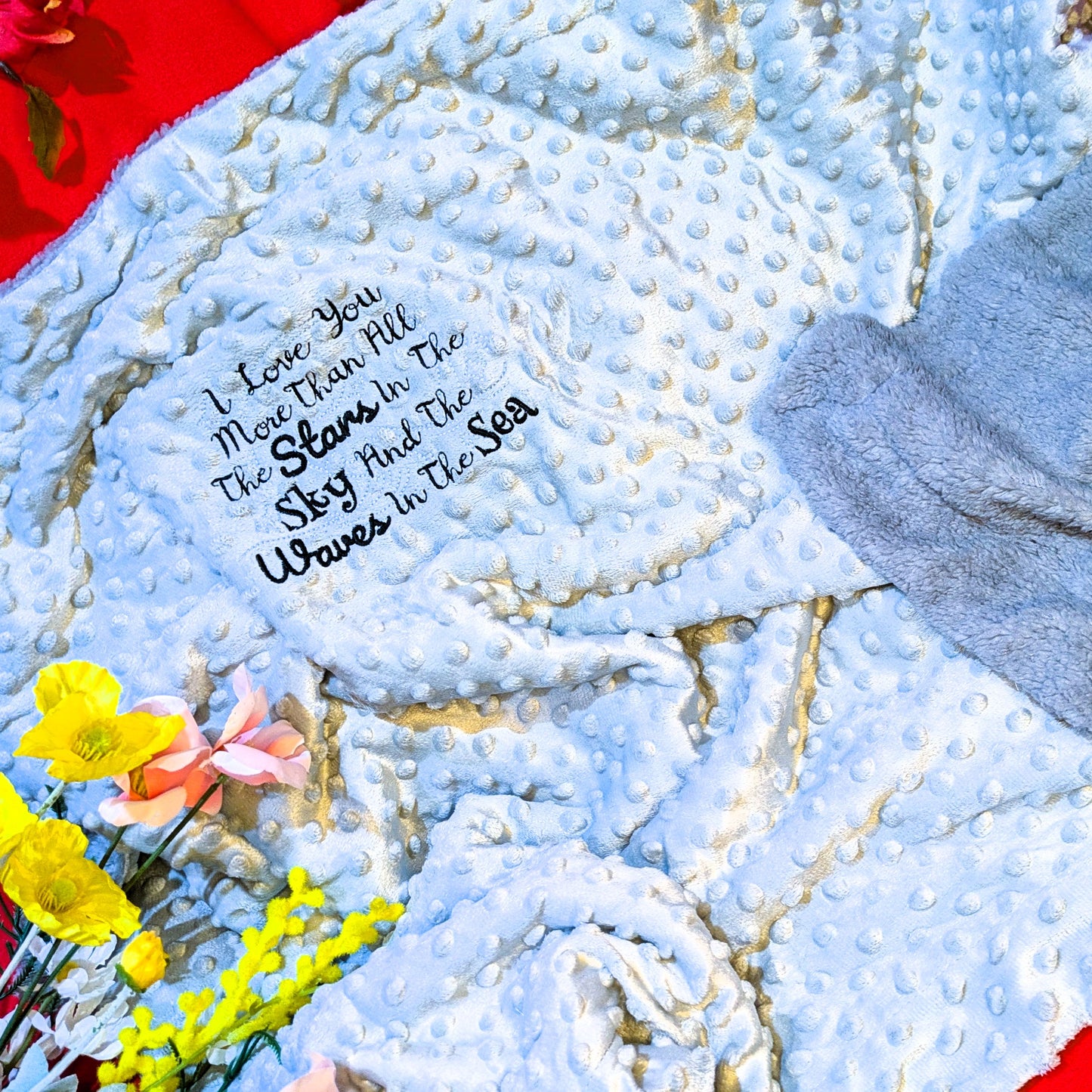 Beautiful embroidered baby blanket with glow in the dark stars.